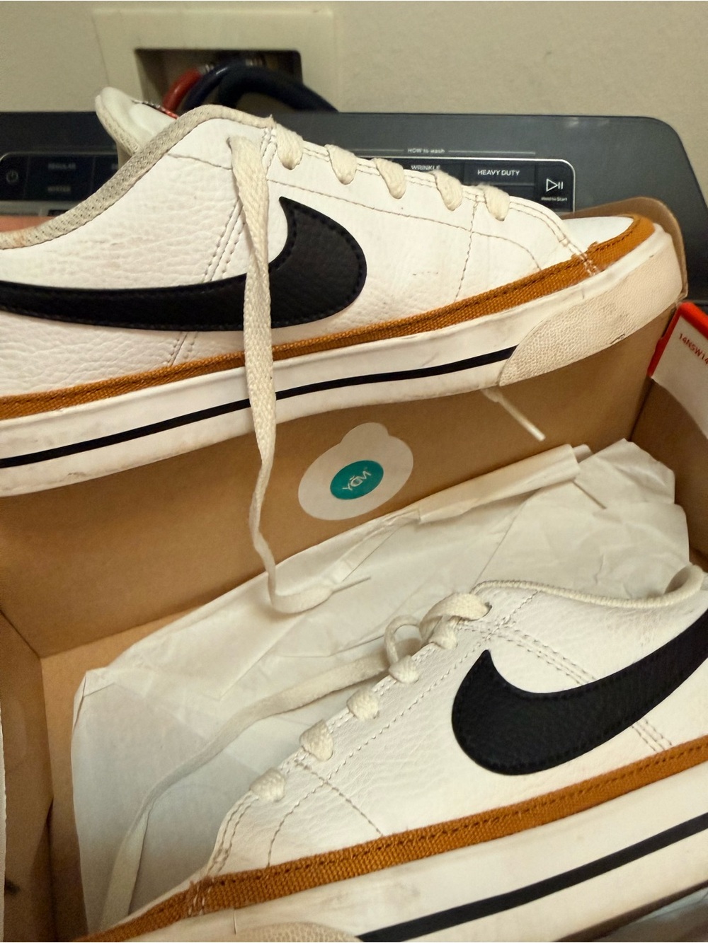 Nike womenโs court legacy sneakers